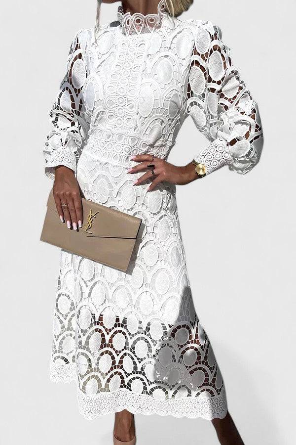 Kryzandra™ elegant dress by Emma & Rose Cape Town, featuring a stylish silhouette and intricate fabric details on a model.