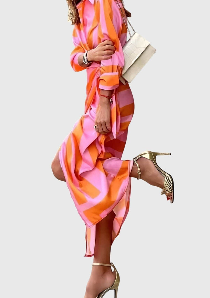 Everly™ elegant wrap dress featuring a floral print by Emma & Rose Cape Town, showcased in a stylish and flowing design.