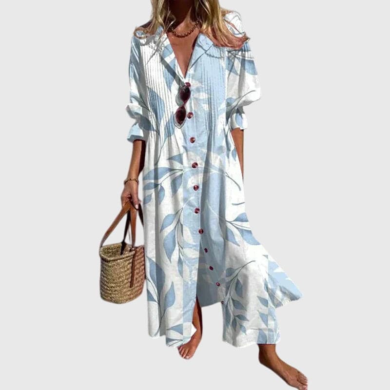 Zariah™ elegant bohemian dress by Emma & Rose Cape Town, flowing fabric with intricate patterns and relaxed fit.