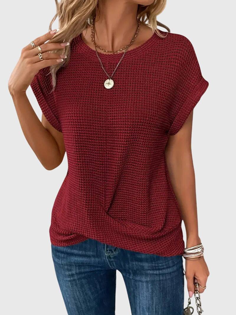 Elegant Emma & Rose Cape Town Isa™ blouse with a classic crew neck, featuring soft fabric and stylish design details.