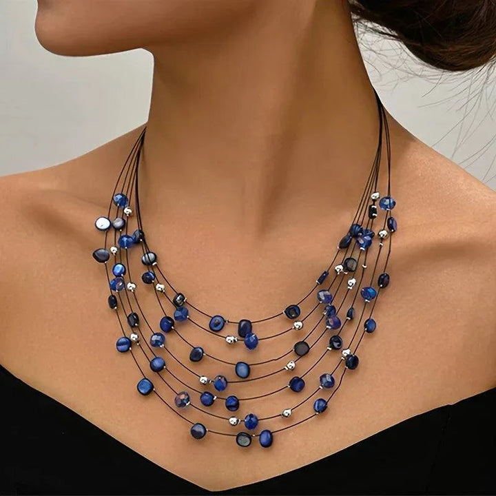 Norheen™ Bohemian pearl necklace featuring layered strands and natural pearl beads, stylish jewelry by Emma & Rose Cape Town.