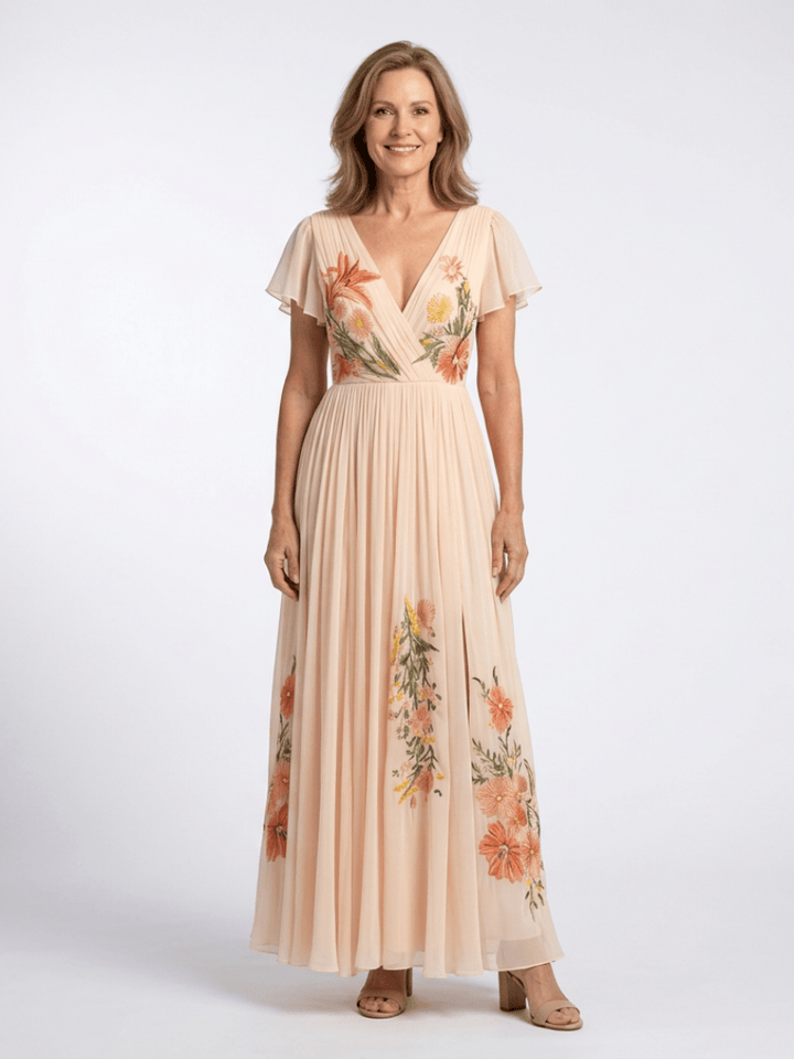Calista™ Emma & Rose Cape Town v-neck short dress in soft fabric, displayed on a hanger with a simple background.
