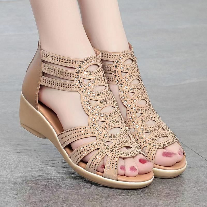 Black Una™ Roman sandal by Emma & Rose Cape Town with sleek straps and flat sole, designed for casual summer wear.