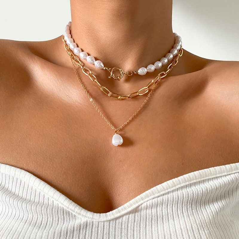 Hester™ vintage pearl necklace by Emma & Rose Cape Town featuring elegant pearls and intricate design.