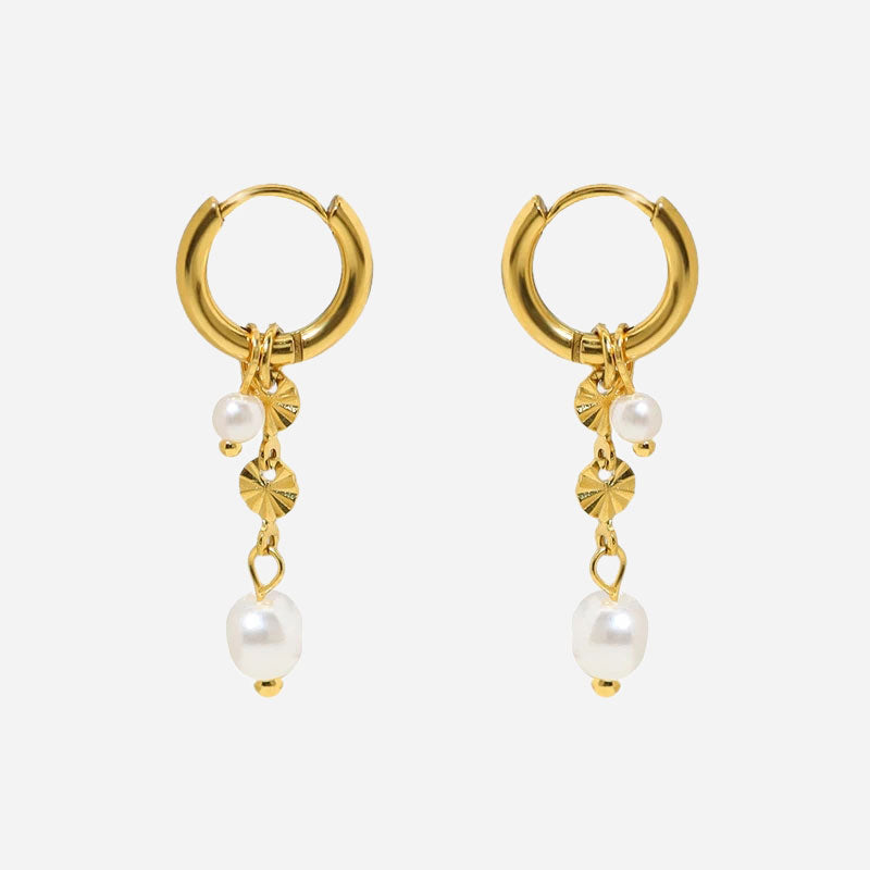 Lyannette™ Sunburst Earrings in 18k gold by Emma & Rose Cape Town, featuring a radiant sunburst design with polished gold finish.