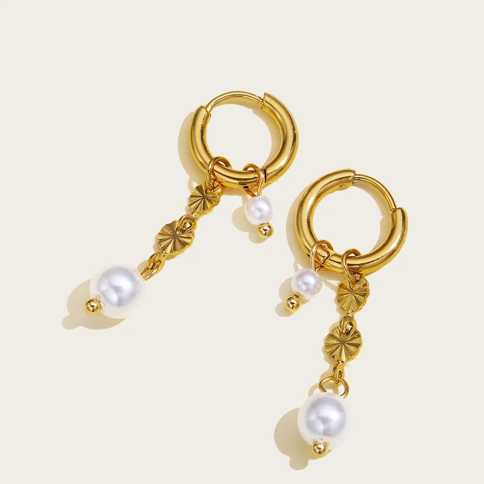 Lyannette™ Sunburst Earrings in 18k gold by Emma & Rose Cape Town, featuring a radiant sunburst design.
