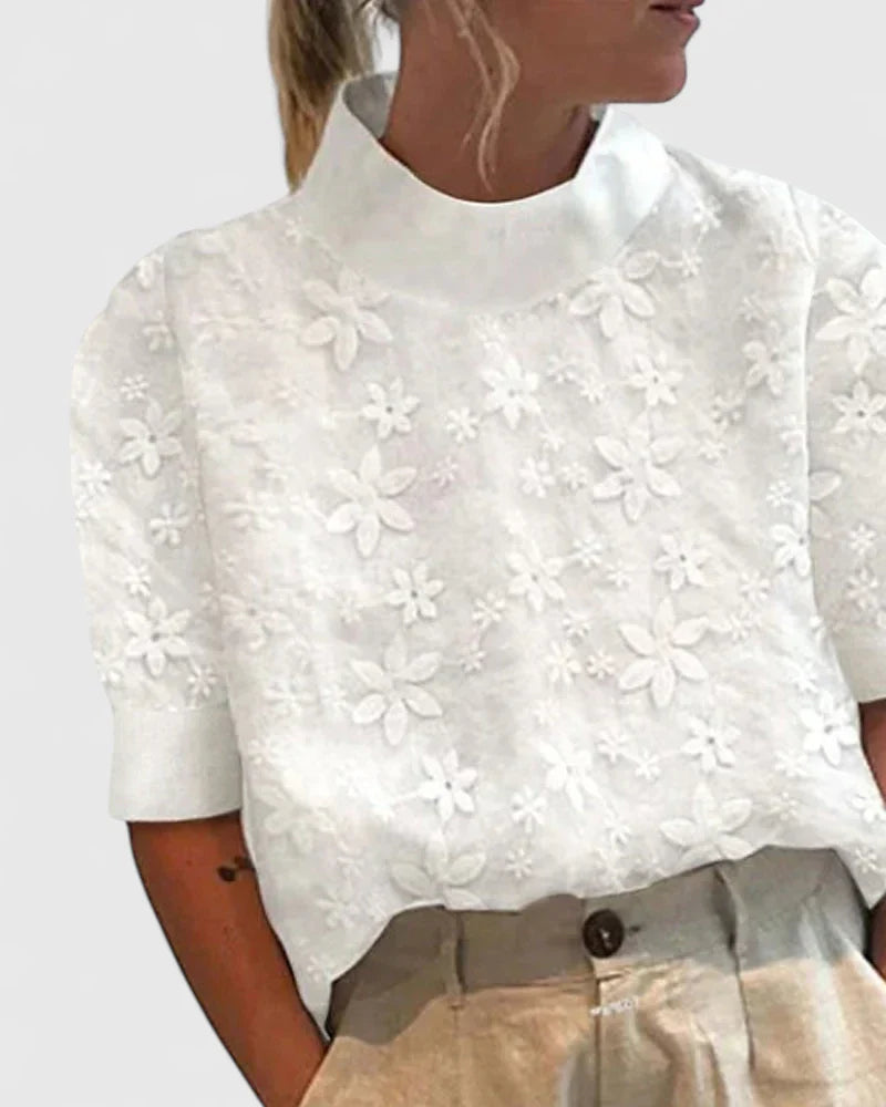 White Rosalyetta Elegant Blouse from Emma & Rose Cape Town's 25 Aug Collectie collection, featuring a stylish, feminine design.