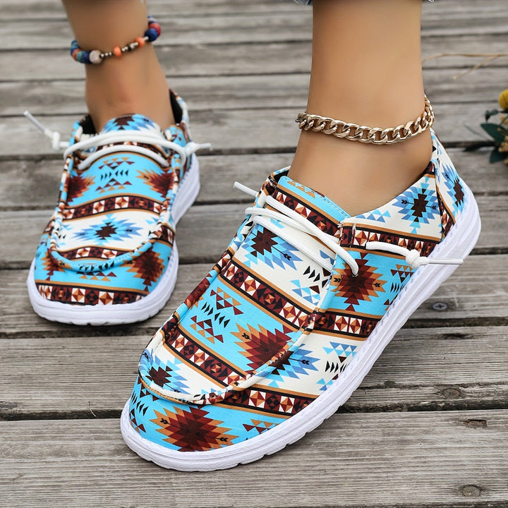 Emma & Rose Cape Town Maria Bohemian Shoes featuring intricate embroidery and a casual slip-on design.
