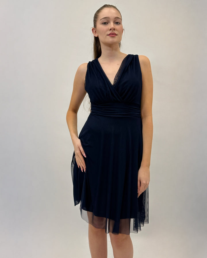 Black Hanneke™ Short Gaia Dress by Emma & Rose Cape Town, stylish lightweight abiti with a relaxed fit, displayed on a hanger.