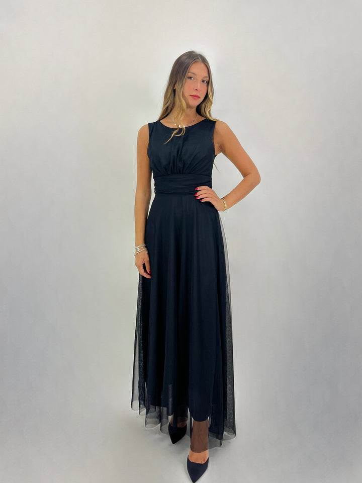 Black Jolien Arianna Dress by Emma & Rose Cape Town, elegant abiti with flowing fabric and stylish design, shown on a model.