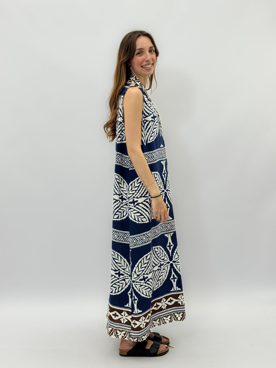 Lightweight™ blue long dress pattern by Emma & Rose Cape Town, showcasing a flowing, elegant abiti design with intricate details.