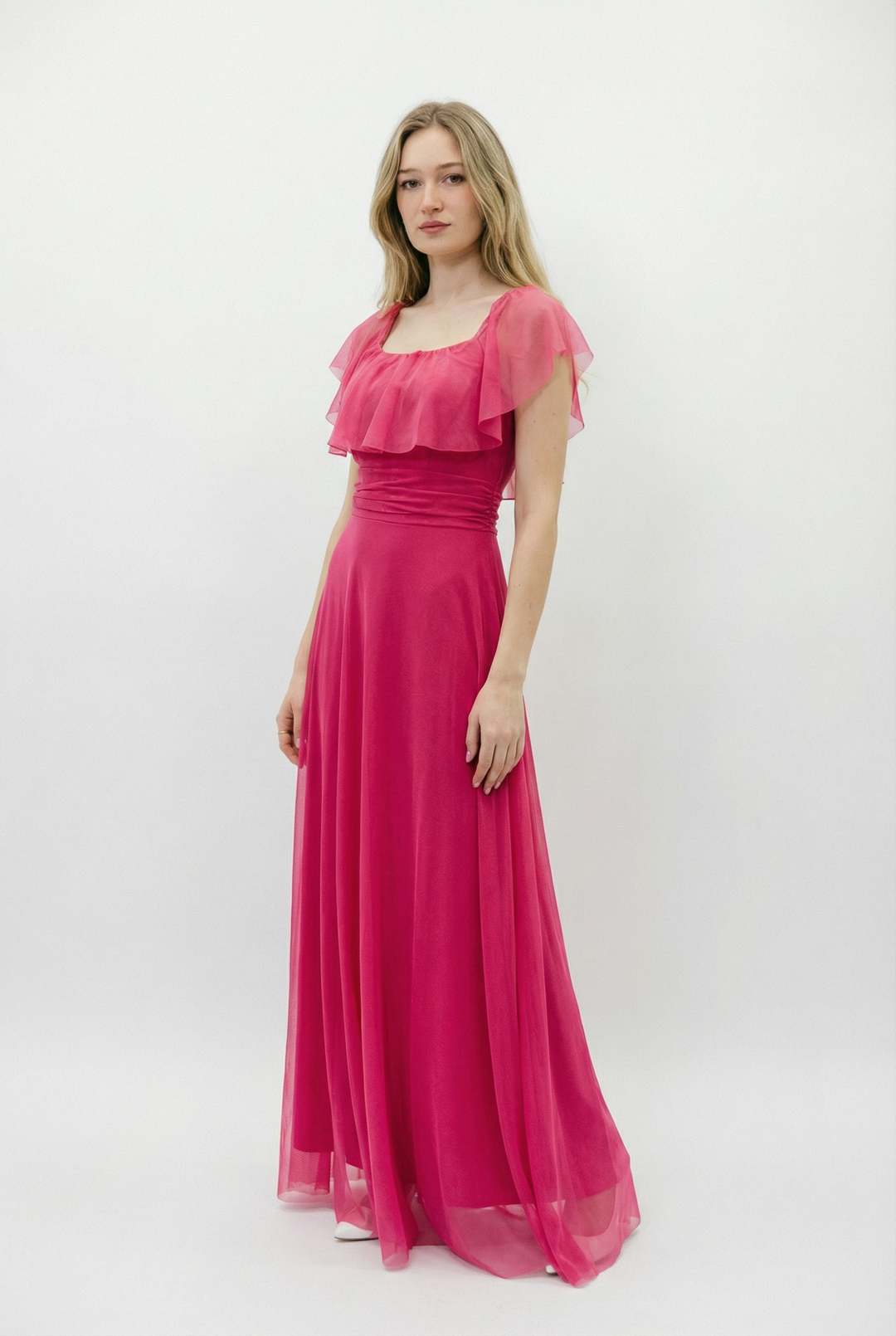 Long fuchsia Carien™ Arden dress by Emma & Rose Cape Town, elegant evening gown with flowy fabric and intricate details.