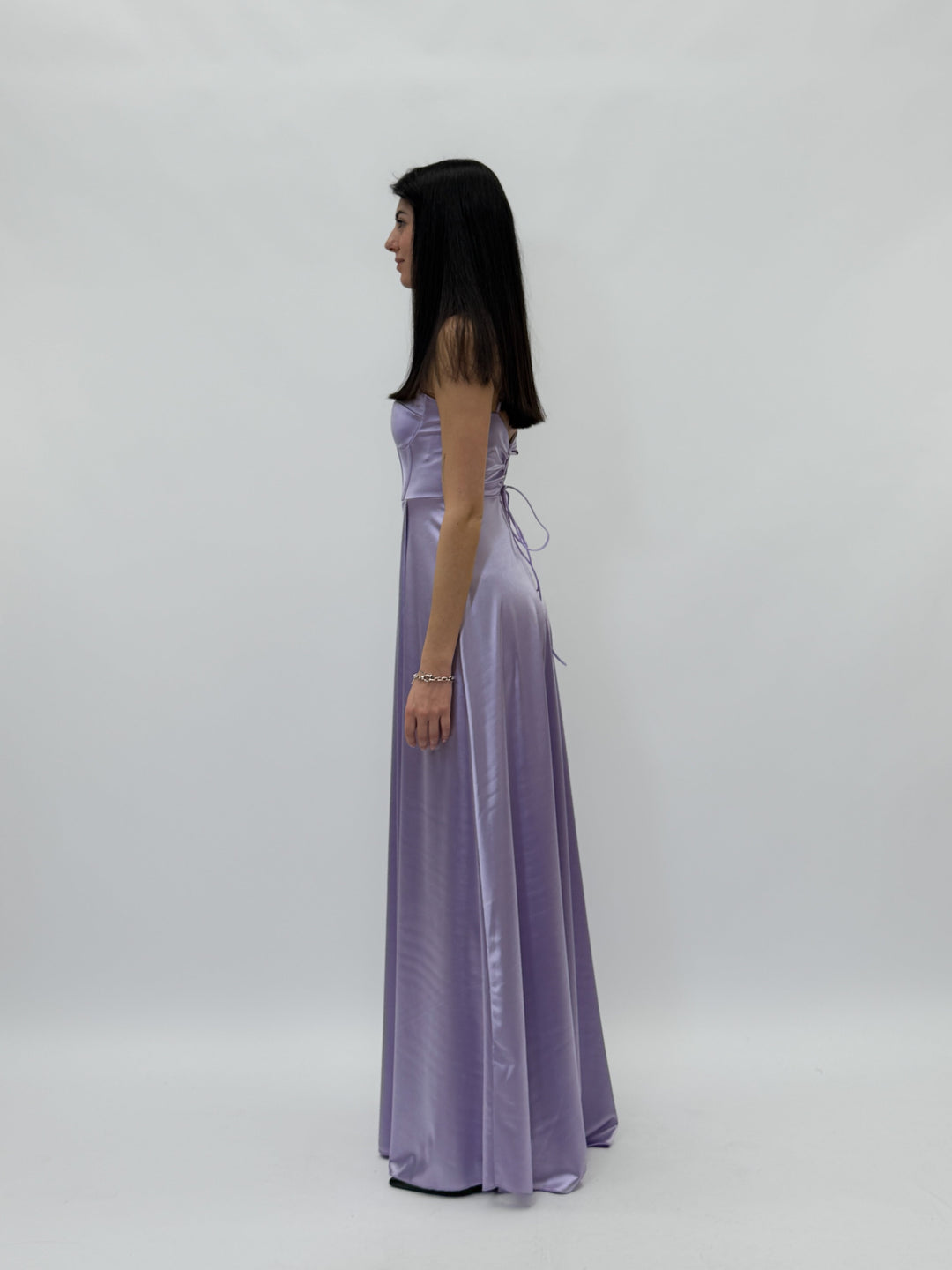Fuchsia Vanessa™ flowing dress by Emma & Rose Cape Town, lightweight and elegant, displayed on a hanger.