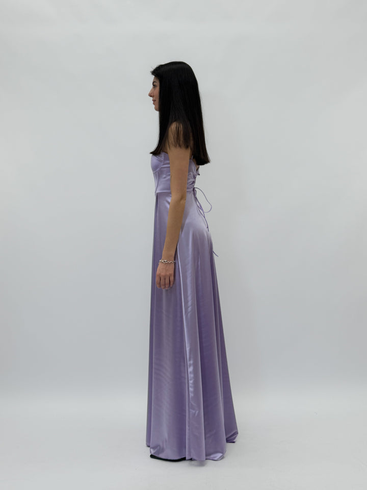 Fuchsia Vanessa™ flowing dress by Emma & Rose Cape Town, lightweight and elegant, displayed on a hanger.
