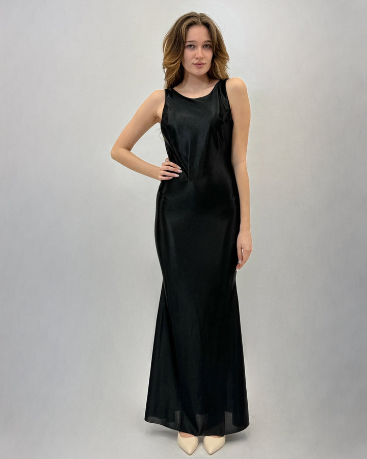Green Ingrid™ dress by Emma & Rose Cape Town featuring soft luxurious fabrics and a boat neckline.