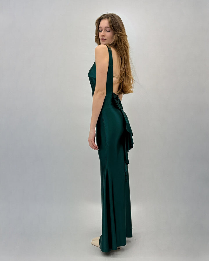 Green Ingrid™ dress by Emma & Rose Cape Town with soft luxurious fabrics and a boat neckline, showcased on a model.