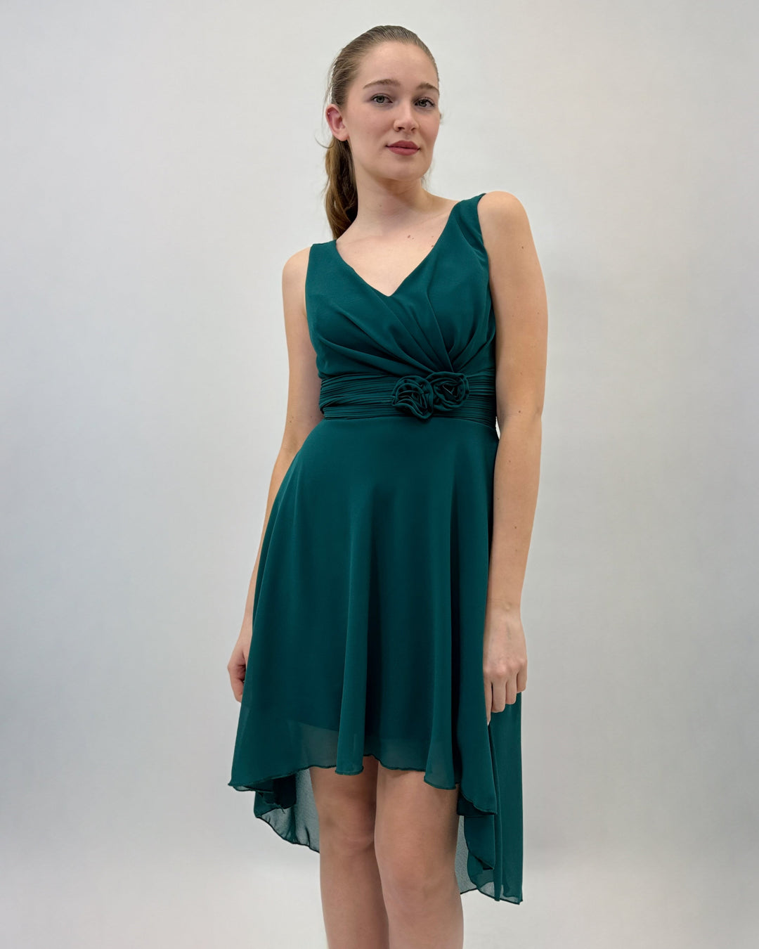 Green Moana™ flowing dress by Emma & Rose Cape Town, lightweight and elegant abiti for girls, with a flowing, comfortable fit.