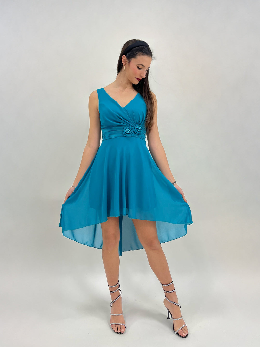 Green Moana™ flowing dress by Emma & Rose Cape Town, lightweight fabric with a relaxed fit and vibrant tropical print.
