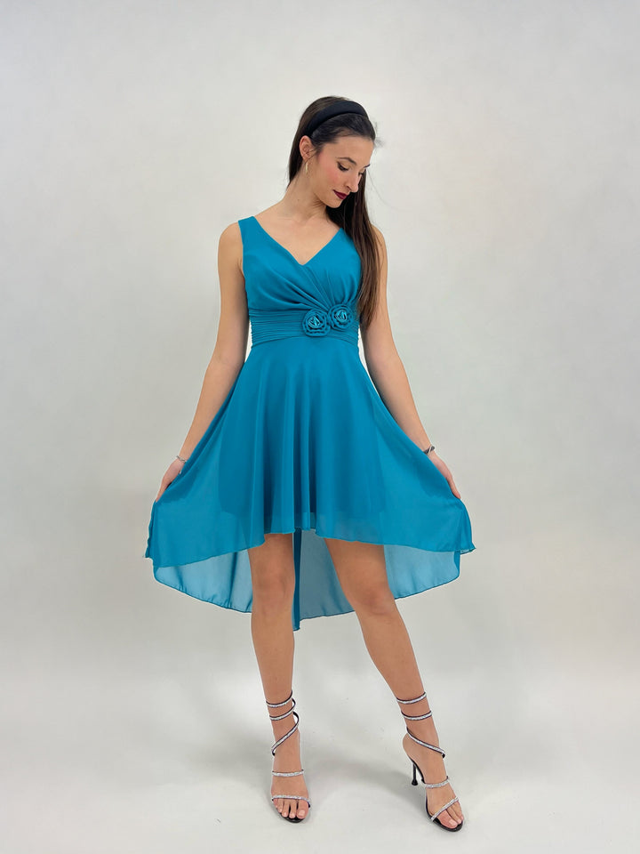 Green Moana™ flowing dress by Emma & Rose Cape Town, lightweight fabric with a relaxed fit and vibrant tropical print.