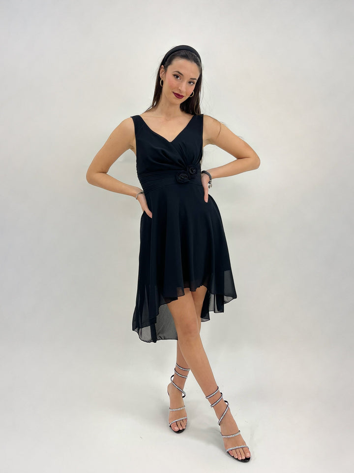 Green Moana™ flowing dress by Emma & Rose Cape Town, featuring lightweight fabric and vibrant design for elegant wear.