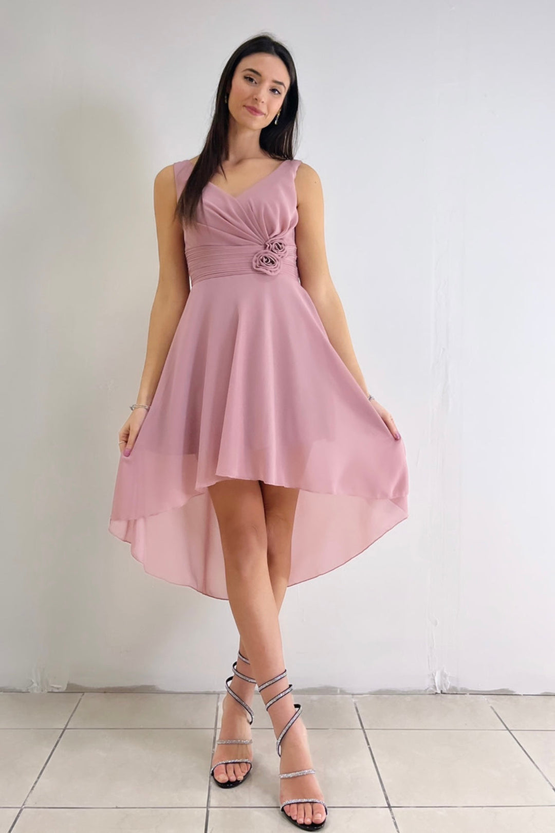 Green Moana™ flowing dress by Emma & Rose Cape Town, soft fabric with elegant design and vibrant color.