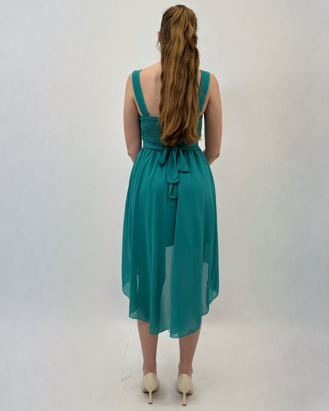 Green Moana™ flowing dress by Emma & Rose Cape Town, lightweight and elegant, shown on a model.
