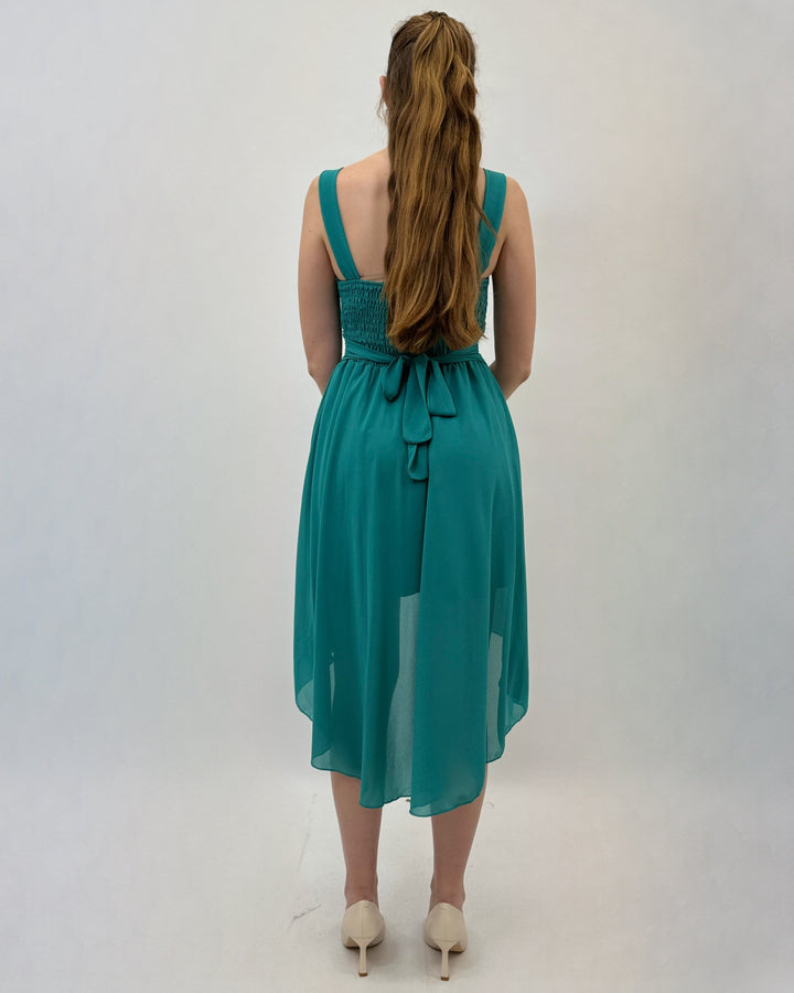 Green Moana™ flowing dress by Emma & Rose Cape Town, lightweight and elegant, shown on a model.