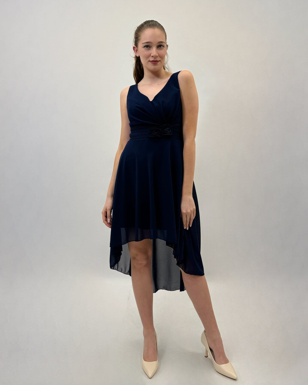 Green Moana flowing dress by Emma & Rose Cape Town, lightweight fabric with elegant drape, perfect for warm weather.
