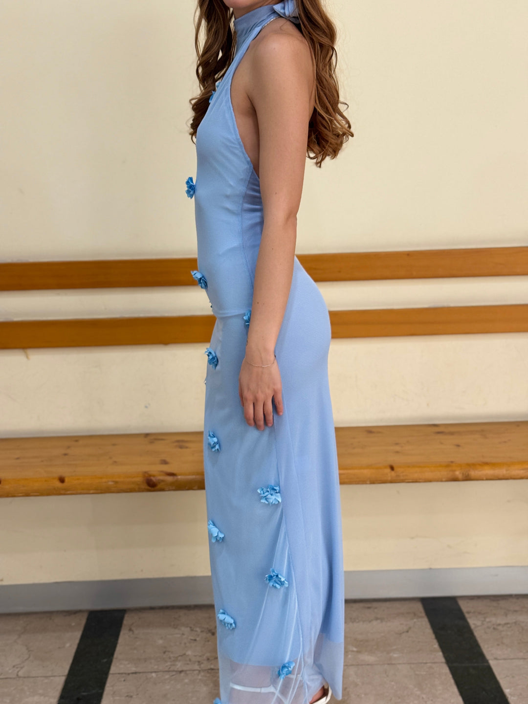 Light blue Fitted™ long dress by Emma & Rose Cape Town with floral appliqué details and elegant, flowing design.