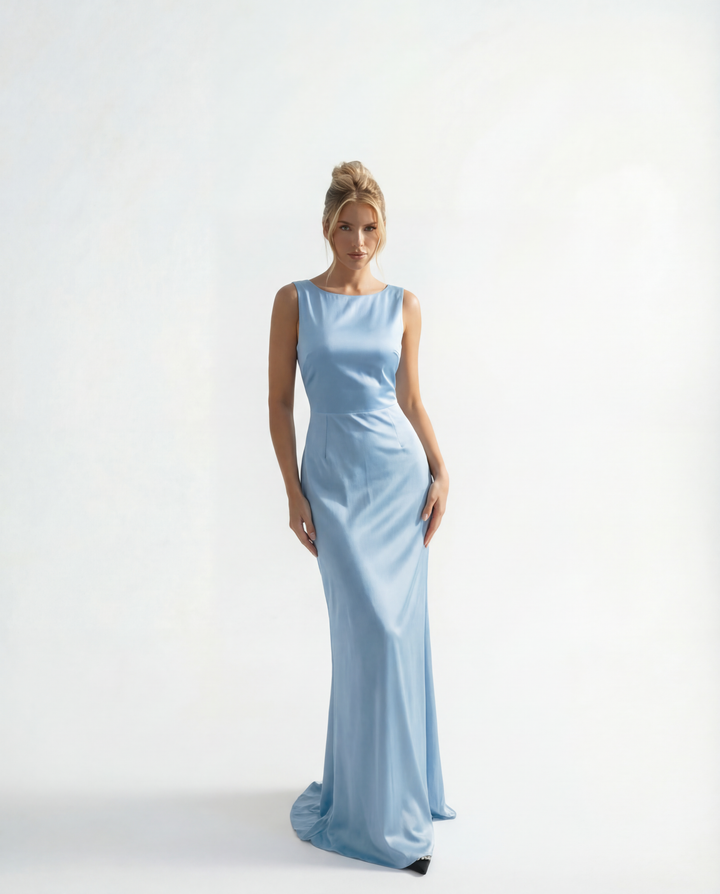 Light blue Karla long dress by Emma & Rose Cape Town, backless design, perfect for ceremonies and formal occasions.