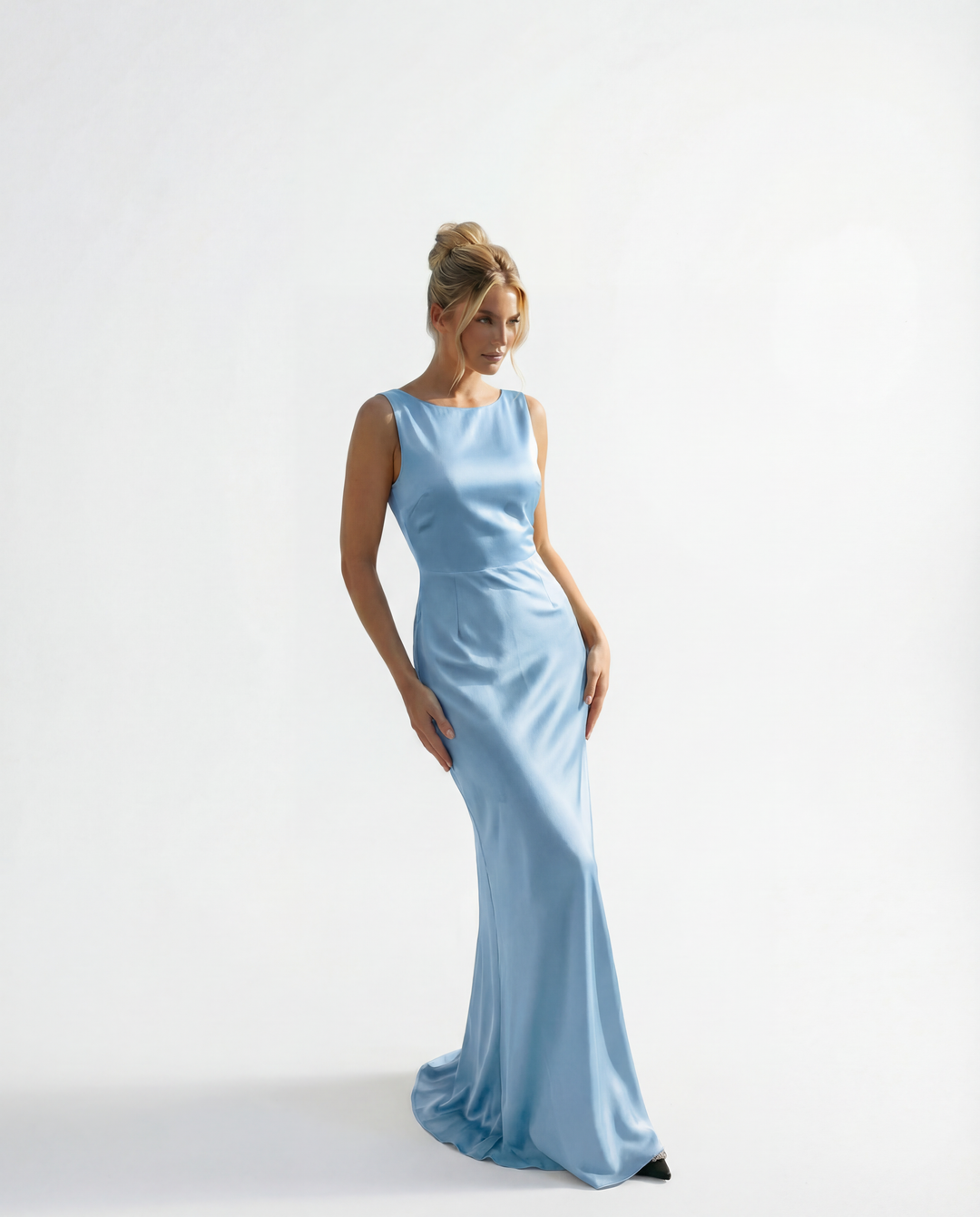 Light blue Karla long dress by Emma & Rose Cape Town, backless design, perfect for ceremonies, elegant formal abiti.