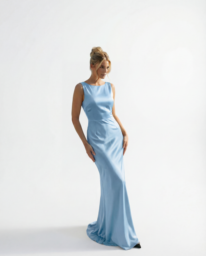 Light blue Karla long dress by Emma & Rose Cape Town, backless design, perfect for ceremonies, elegant formal abiti.