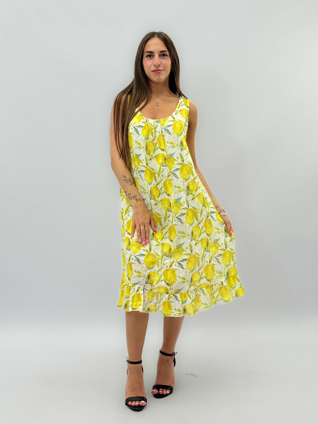 Yellow Lemon™ print dress by Emma & Rose Cape Town, stylish abiti with vibrant lemon pattern and flowing fabric.