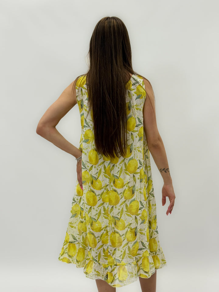 Yellow Lemon™ print dress by Emma & Rose Cape Town, lightweight fabric with vibrant lemon design, perfect for summer wear.