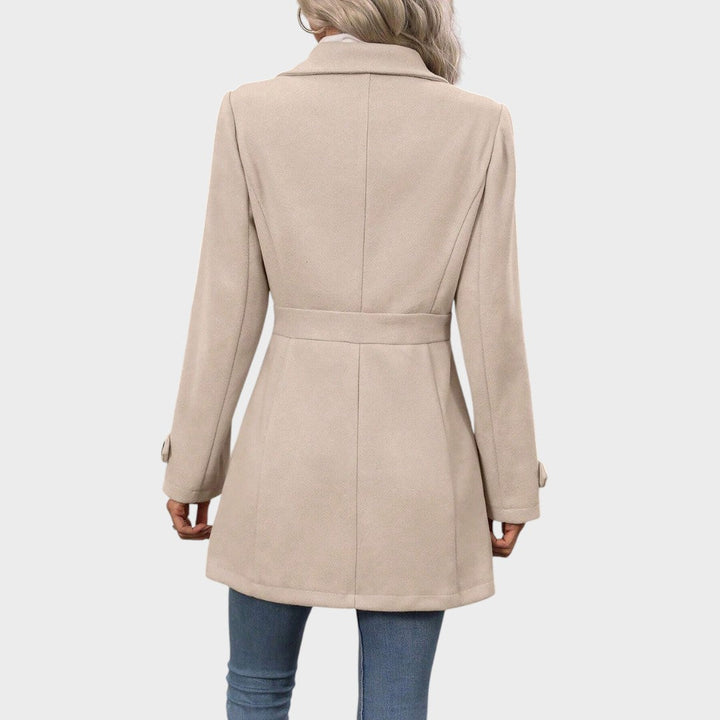 Elegant Emma & Rose Cape Town Channel™ coat in stylish fabric, featuring a tailored fit and classic design suitable for formal wear.