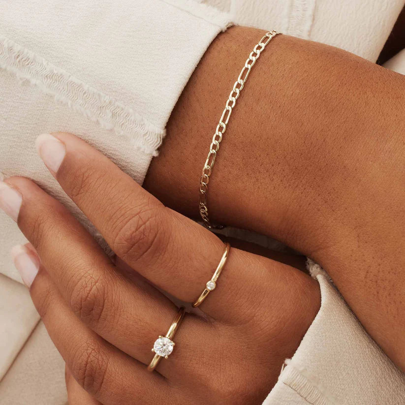 Felianorah™ 18k gold bracelet by Emma & Rose Cape Town, elegant gold armband with intricate design and polished finish.