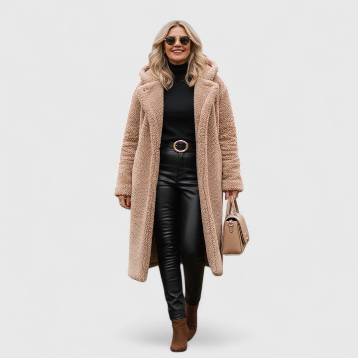 Beige Brionyssa™ elegant jacket by Emma & Rose Cape Town, shown on a hanger with detailed fabric and tailored fit.