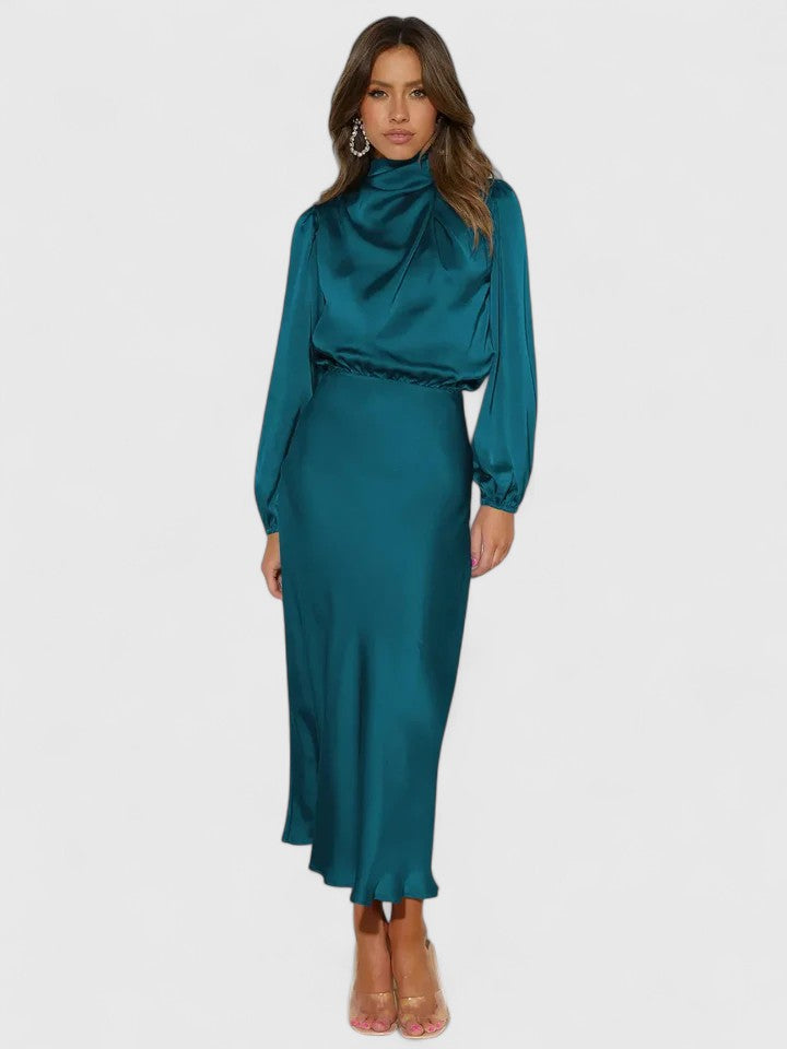 Beige Emryssah™ elegant maxi dress by Emma & Rose Cape Town, flowing fabric with a sophisticated silhouette.