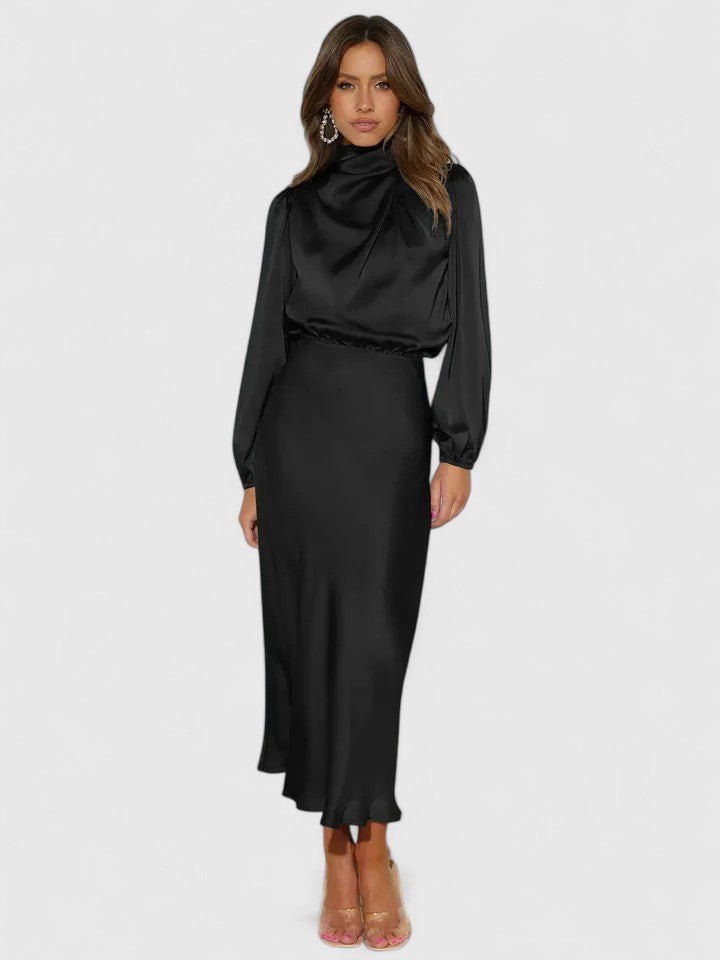 Beige Emryssah™ elegant maxi dress by Emma & Rose Cape Town, flowing fabric and stylish design for sophisticated occasions.