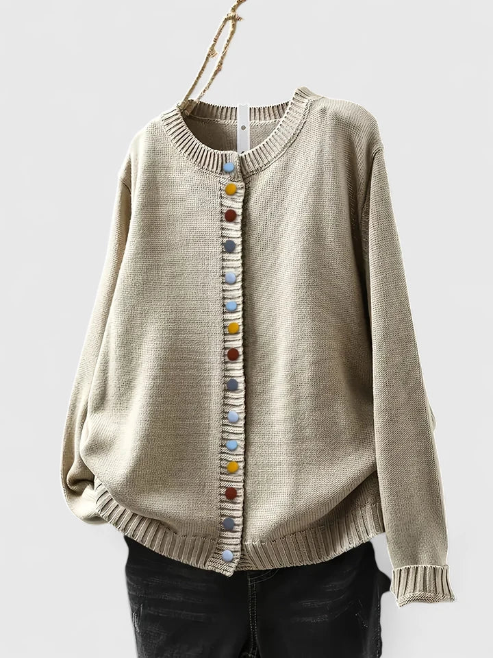 Beige Kalynnah™ comfortable cardigan by Emma & Rose Cape Town, shown laid flat highlighting soft knit fabric and relaxed fit.