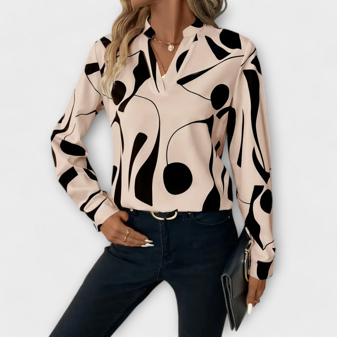 Beige Lara™ elegant blouse from Emma & Rose Cape Town, featuring a stylish, flowing design and sophisticated details.