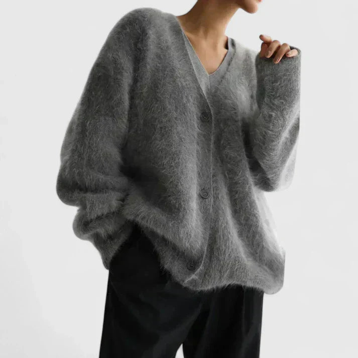 Beige Lucerinna™ comfortable cardigan by Emma & Rose Cape Town, shown on a model, with soft knit fabric and relaxed fit.
