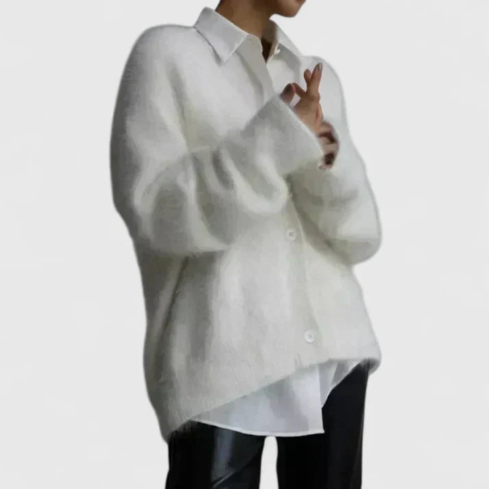 Beige Lucerinna™ comfortable cardigan by Emma & Rose Cape Town, shown folded with soft knit fabric and relaxed fit.