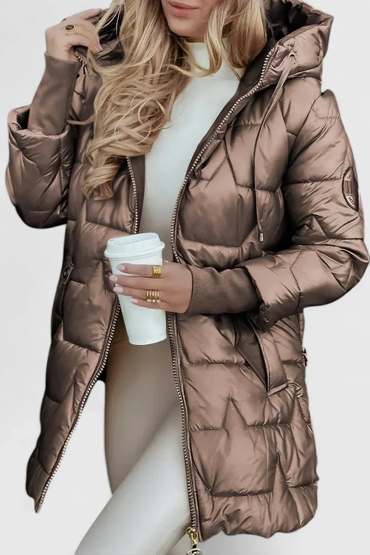 Beige Lyzzandra™ comfortable coat by Emma & Rose Cape Town, shown on a hanger with soft fabric and tailored fit.