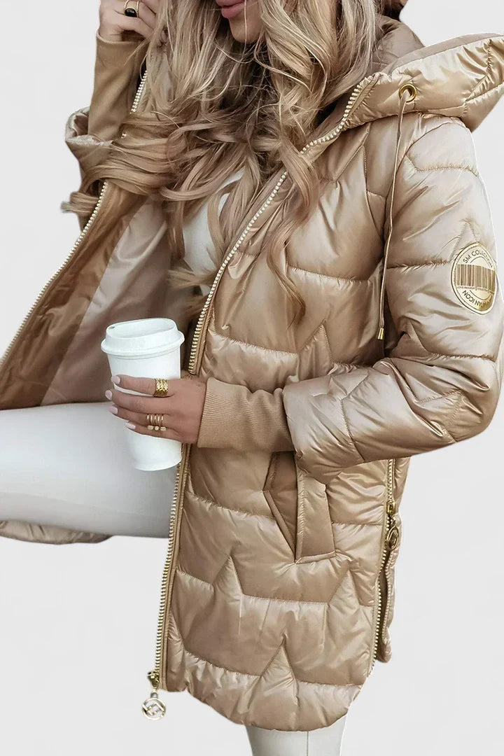 Beige Lyzzandra™ comfortable coat by Emma & Rose Cape Town, shown on a model with a relaxed fit and cozy fabric.