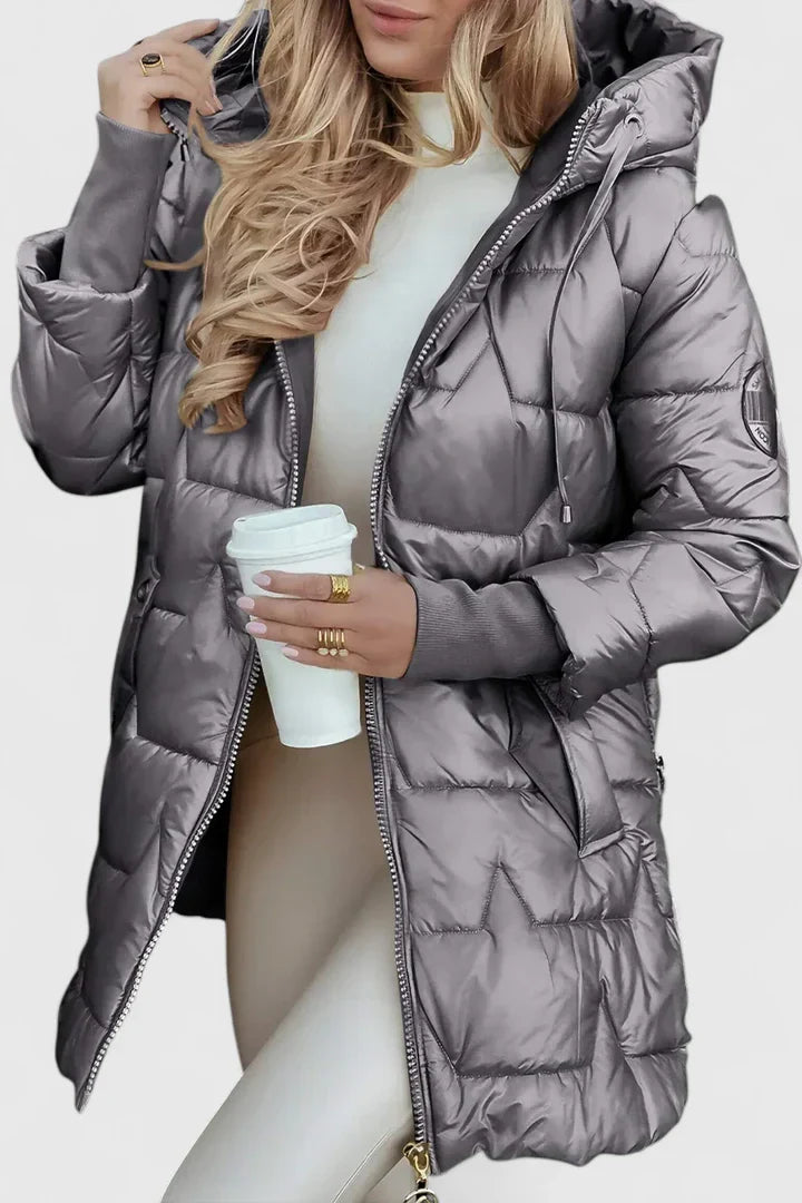 Beige Lyzzandra™ comfortable coat by Emma & Rose Cape Town, shown on a model with a relaxed fit and stylish design.