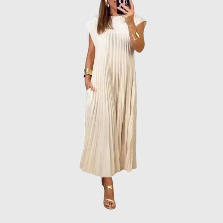 Beige Mariana™ elegant dress by Emma & Rose Cape Town, featuring a sophisticated design and flowing fabric.