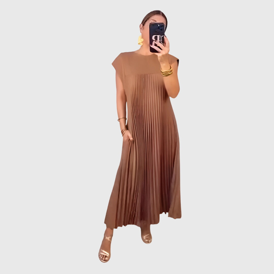 Beige Mariana™ elegant dress by Emma & Rose Cape Town, featuring a flowing silhouette and stylish design.