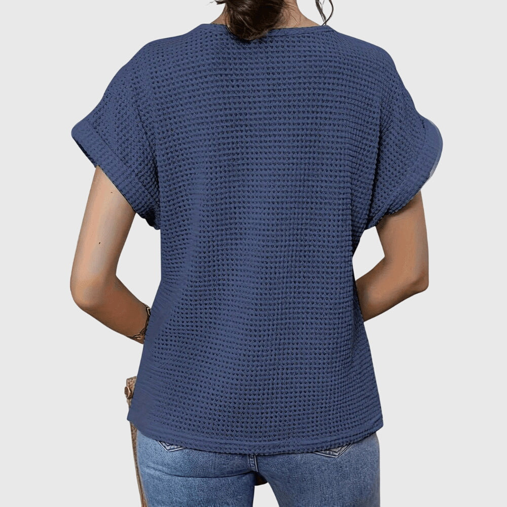 Beige Pearl™ Elegant Ibiza Blouse by Emma & Rose Cape Town, featuring lightweight fabric and stylish design with pearl accents.