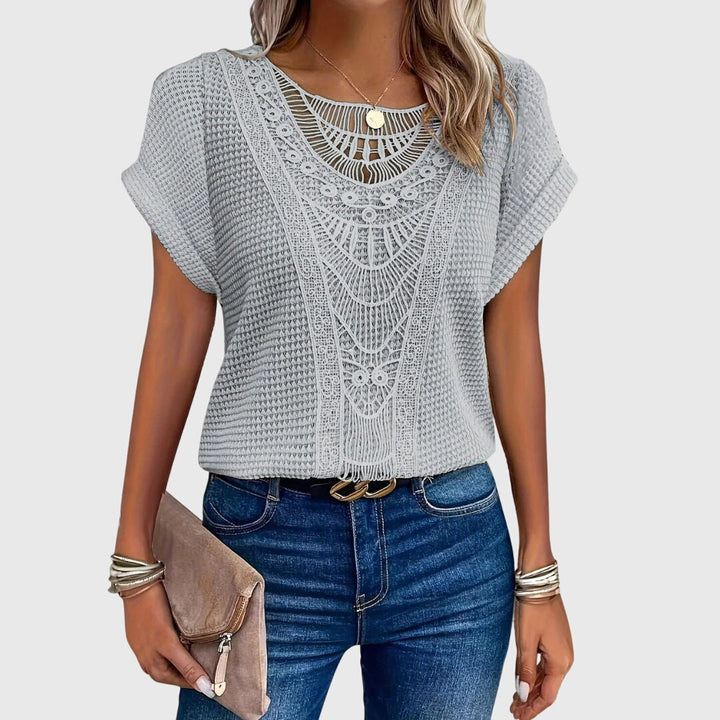 Beige Pearl™ Ibiza blouse by Emma & Rose Cape Town featuring a flowy, elegant fabric with a stylish neckline and relaxed fit.